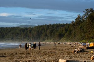 campers walking along the beach